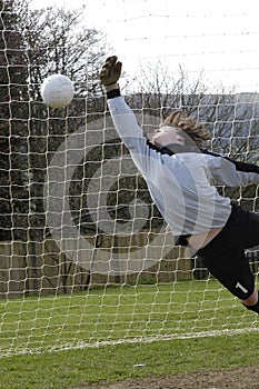 A Diving goalkeeper missing a save !! photo