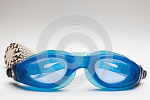 Diving goggles and shell photo