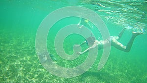 Diving with sea turtles in the clear sea water