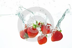 Diving strawberries photo
