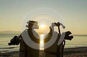 Diving tanks on a sea shore