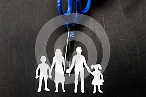 Divorce and child custody scissors cutting family apart