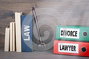 Divorce and Lawyer concept. Wooden gavel and books in background