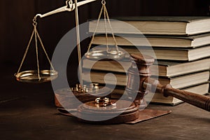 Divorce and separation concept. Judge gavel and golden rings in notary public office