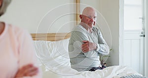 Divorce, stress and senior couple in bedroom, marriage conflict and fight in home. Bed, frustrated elderly man and woman