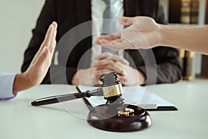 Divorce by two lovers went to the lawyer`s office. The husband tried to plead with his wife not to divorce