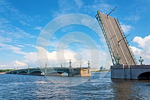 Divorced Troitsky bridge with a raised sash in the afternoon in St. Petersburg