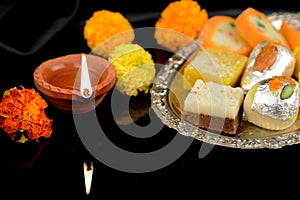 Diwali Diya and Traditional sweets for Diwali celebrations