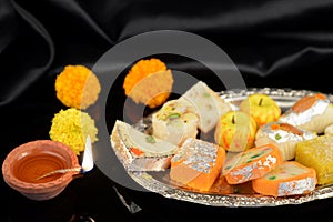 Diwali Diya and Traditional sweets for Diwali celebrations