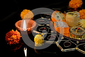 Diwali Diya and Traditional sweets for Diwali celebrations