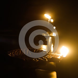 Diwali festival celebrating with glowing Diyas