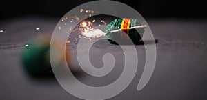 Diwali fire bomb cracker on black background