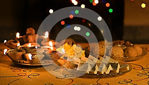 Diwali Lamps with Indian Sweets