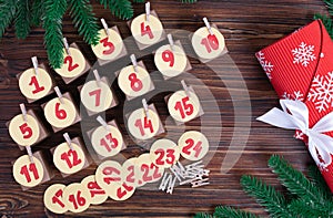 DIY advent calendar. Christmas preparations with gifts and assignments.