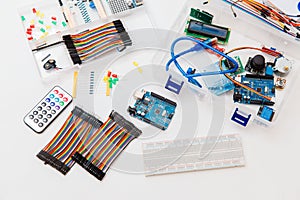 DIY arduino. Flat layout on white background, copy space. Electronic workshop components