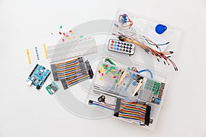DIY arduino. Flat layout on white background, copy space. Electronic workshop components.