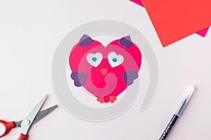 DIY and children's creativity. Step by step instructions on how to make an owl valentine card with hearts. Step 7