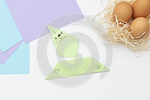 DIY Children& x27;s Easter craft bunny with an egg. Step 20. Easter paper step by step instructions. Happy bunny