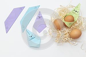 DIY Children& x27;s Easter craft bunny with an egg. Step 24. Easter paper step by step instructions. Happy bunny