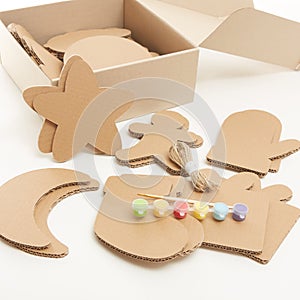 DIY christmas decorations from cardboard paper. Homemade Christmas ornament from reused paper. Craft ideas for kids.