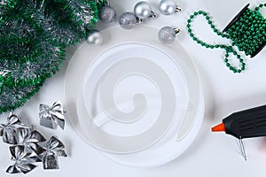 Diy Christmas wreath. Guide on the photo how to make a Christmas wreath with your own hands from a plastic plate, tinsel, beads,