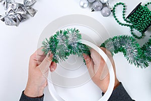 Diy Christmas wreath. Guide on the photo how to make a Christmas wreath with your own hands from a plastic plate, tinsel, beads,