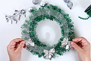 Diy Christmas wreath. Guide on the photo how to make a Christmas wreath with your own hands from a plastic plate, tinsel, beads,