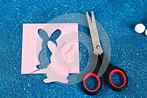 Diy Easter garland bunnies, flags EASTER made paper blue background. Gift idea, decor Spring, Easter