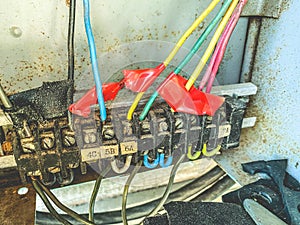 DIY electrical box. small cables, nails and wires in a box for connecting and distributing the electrical network in the house.