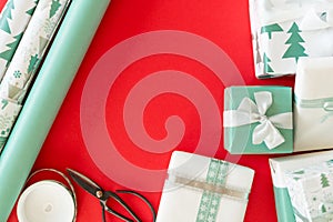 DIY Gift Wrapping. Beautiful nordic christmas gifts Christmas wrapping station concept top view.