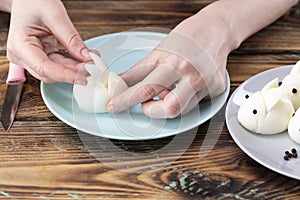 DIY instruction. Step by step guide. Making a funny rabbit from boiled eggs, decorating the Easter table, Easter decor and serving