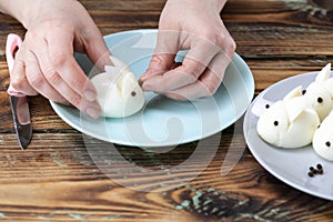DIY instruction. Step by step guide. Making a funny rabbit from boiled eggs, decorating the Easter table, Easter decor and serving