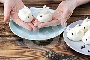 DIY instruction. Step by step guide. Making a funny rabbit from boiled eggs, decorating the Easter table, Easter decor and serving