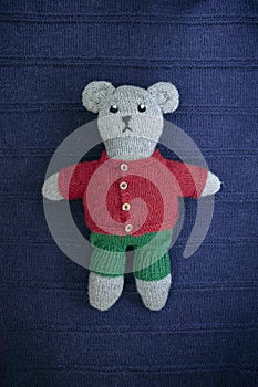 DIY knitted bear toy. Sweet, soft woollen teddy bear handmade