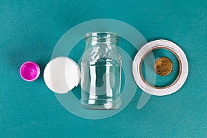 Diy Mothers Day vase with text from a glass jar, pink paint, sparkles glitter, stars, a gold ribbon