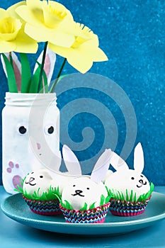 Diy rabbit from easter eggs on blue background. Gift ideas, decor Easter, spring. Handmade