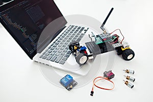 Diy rc car with components on laptop photo