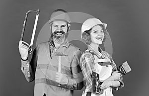 DIY repair. Construction workers. Home renovation. Couple renovating house. Woman builder hard hat. Man engineer or