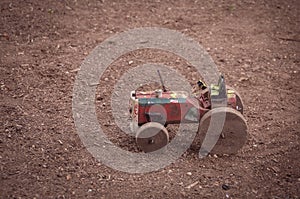 DIY wooden toy tractor made with recyclable materials.