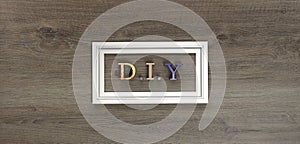 DIY word wrote on wooden background