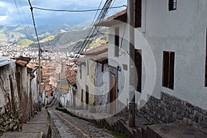 Dizzying heights of Cuzco from a cobbled lane