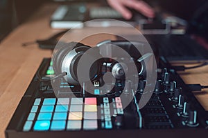 DJ Adult man creates electronic music in the studio