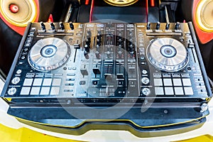 DJ console cd mp4 deejay mixing desk music party in nightclub