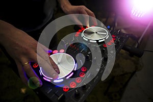 DJ console mixer controlling with two hand