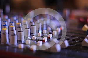 DJ music mixer control panel in macro