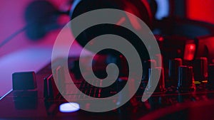 DJ mix studio audio tracks mixing buttons pads decks mixing console frequencies