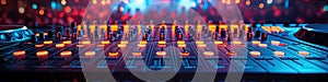 DJ mixer board console with turntable in nightclub in booth at night party