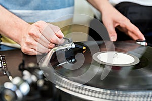 Dj mixes the track in club