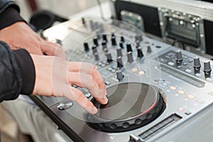 Dj mixes track at party