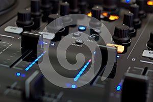 DJ mixing in a club, close up.